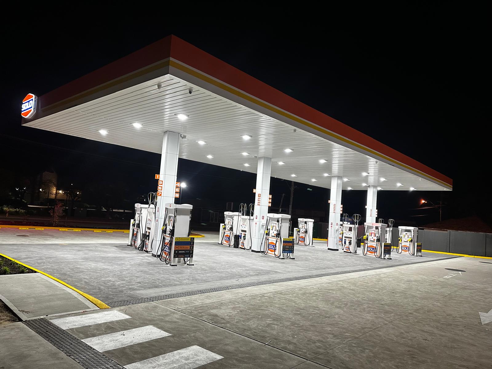 SOLO Hamilton Hill forecourt lit up at night